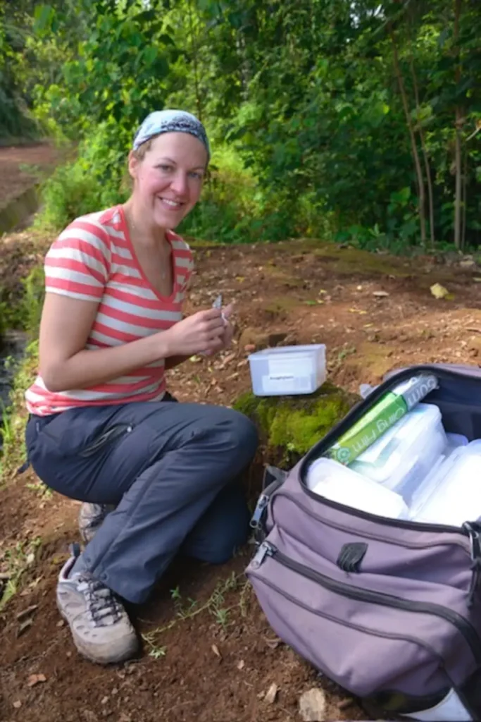 Dr Ellen Welch preparing medical supplies during expedition work
